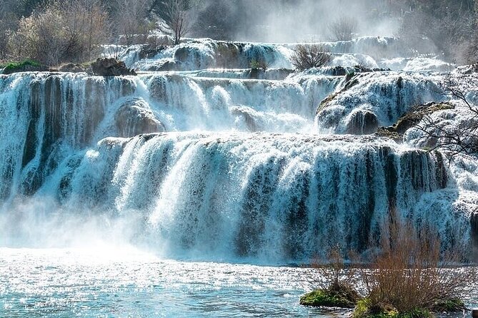 Airport Zadar or Zadar to Split via Krka waterfalls for singles or couples - Three hours among Krka’s waterfalls