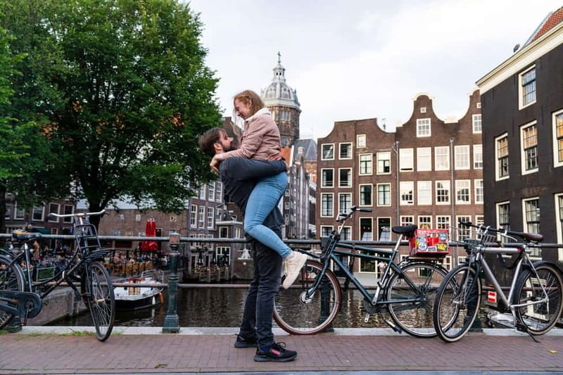 Amsterdam Canals Photoshoot: Private Solo, Family or Couples - Damrak Avenue, Amsterdam’s classic first frame