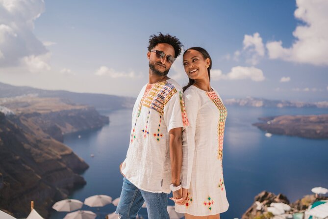 Couple and Family Photoshoot Experiece in Santorini - White walls, blue domes, and a moving photo session