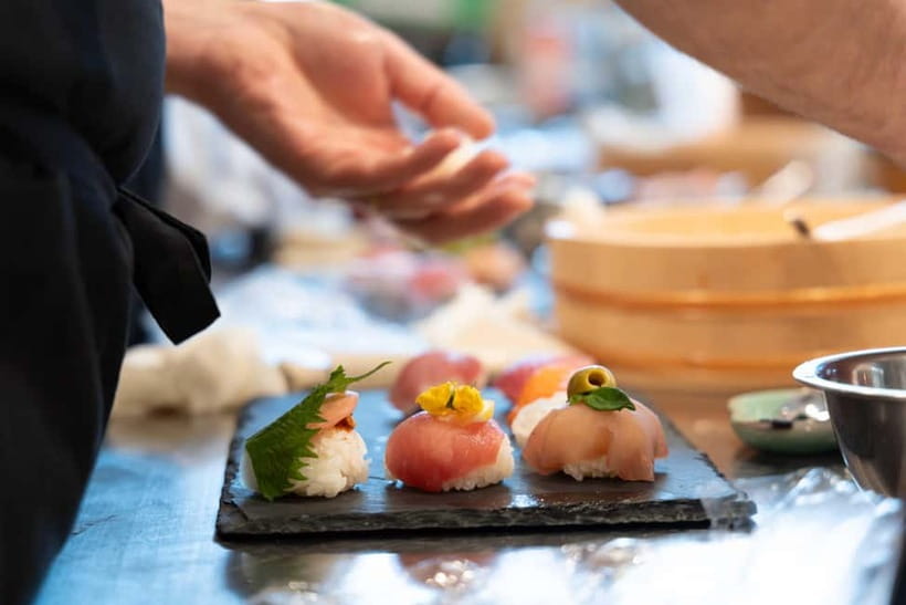 Kyoto: Enjoy Sushi & Market Tour! Best for Family & Couple! - Sitting down to eat what you made